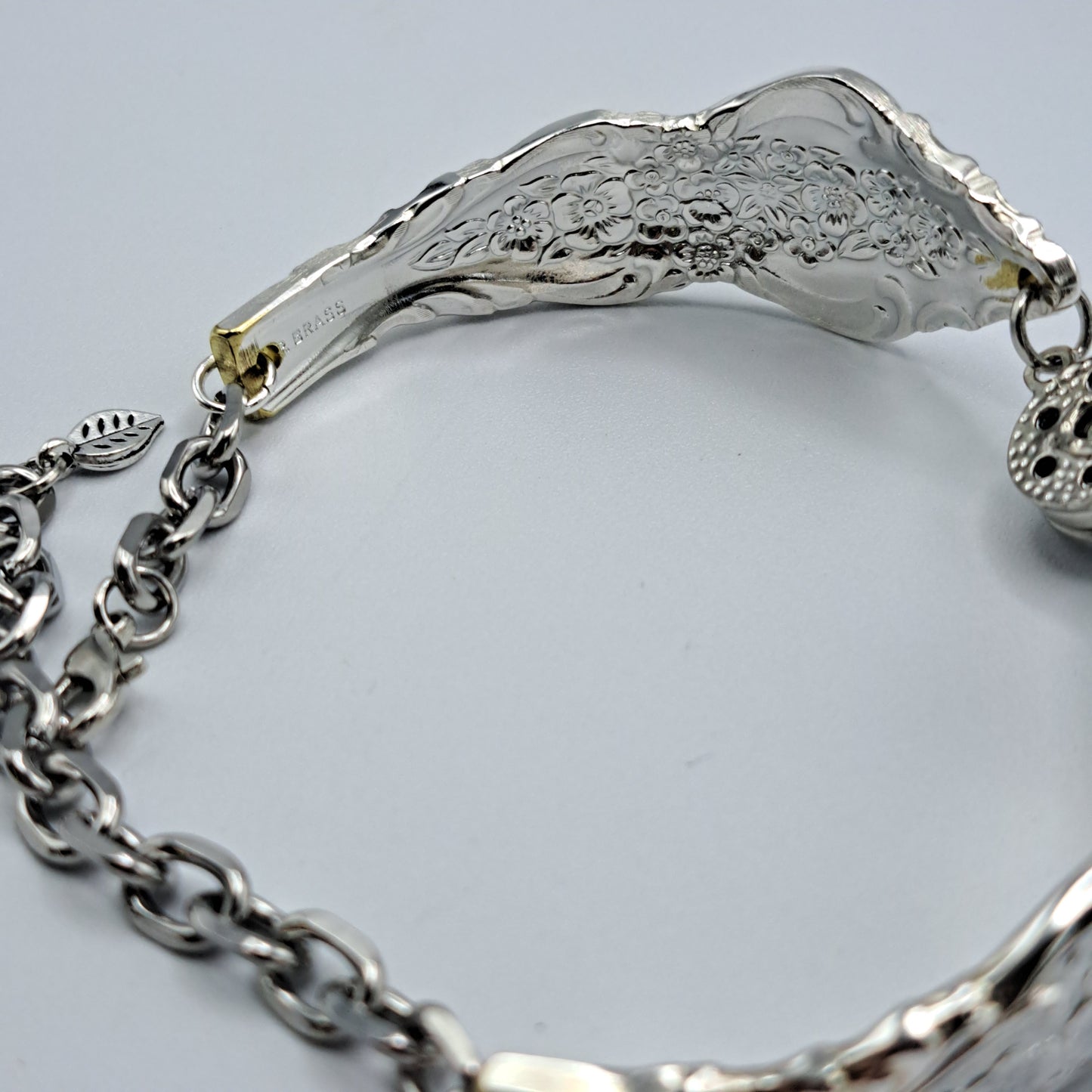 Handmade vintage silverware bracelet made from Silver Renaissance 1971 pattern silverplated handles with center snap charm