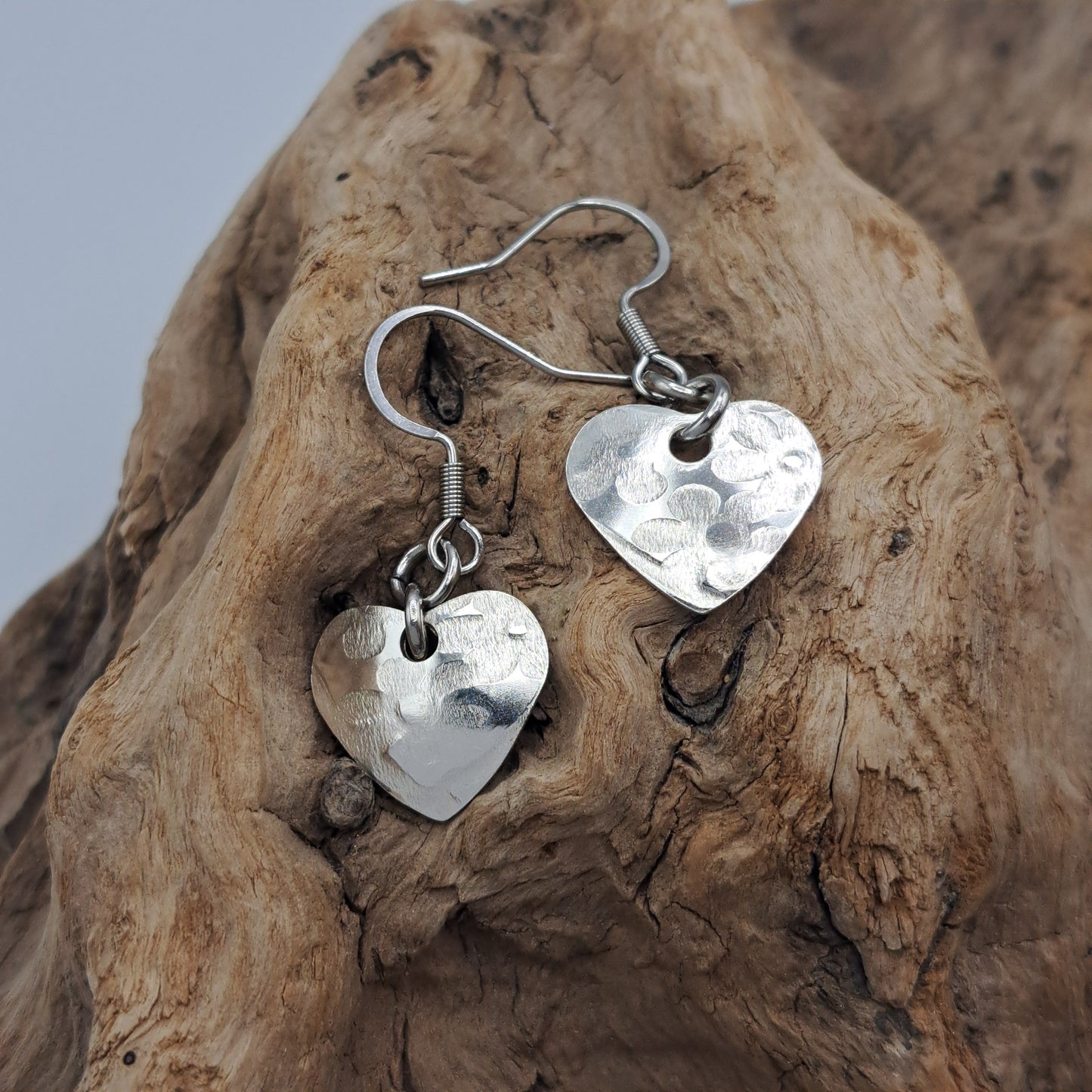 Handmade vintage silverware earrings made from silver-plated flattened spoon bowls