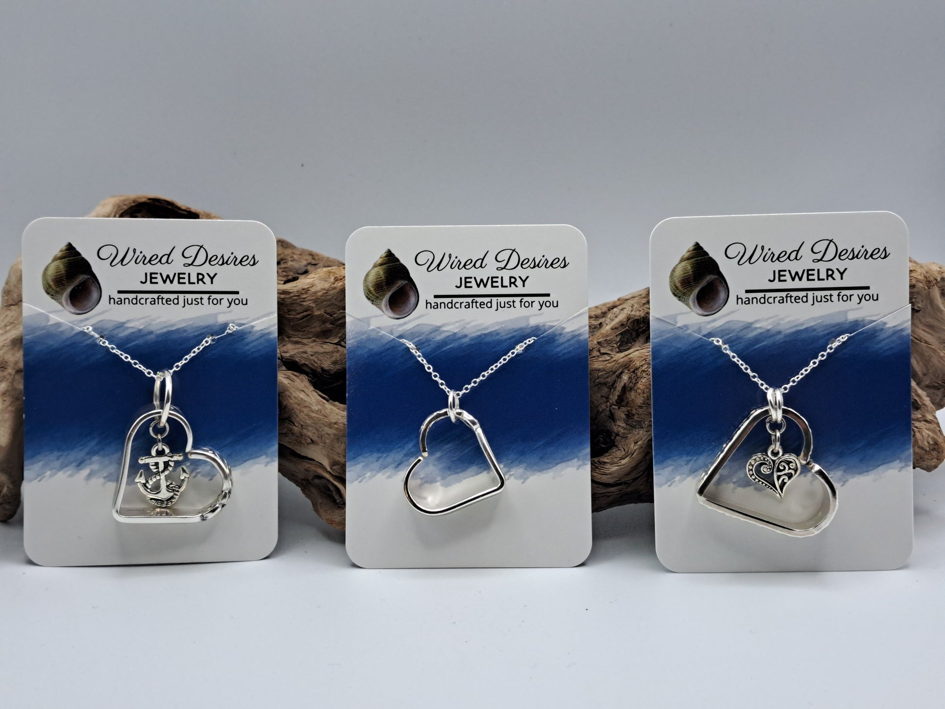 Handmade vintage silverware heart necklace made from various silverplate patterns 