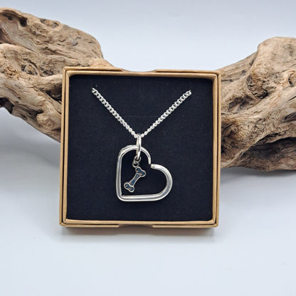 Handmade vintage silverware heart necklace made from various silverplate patterns 