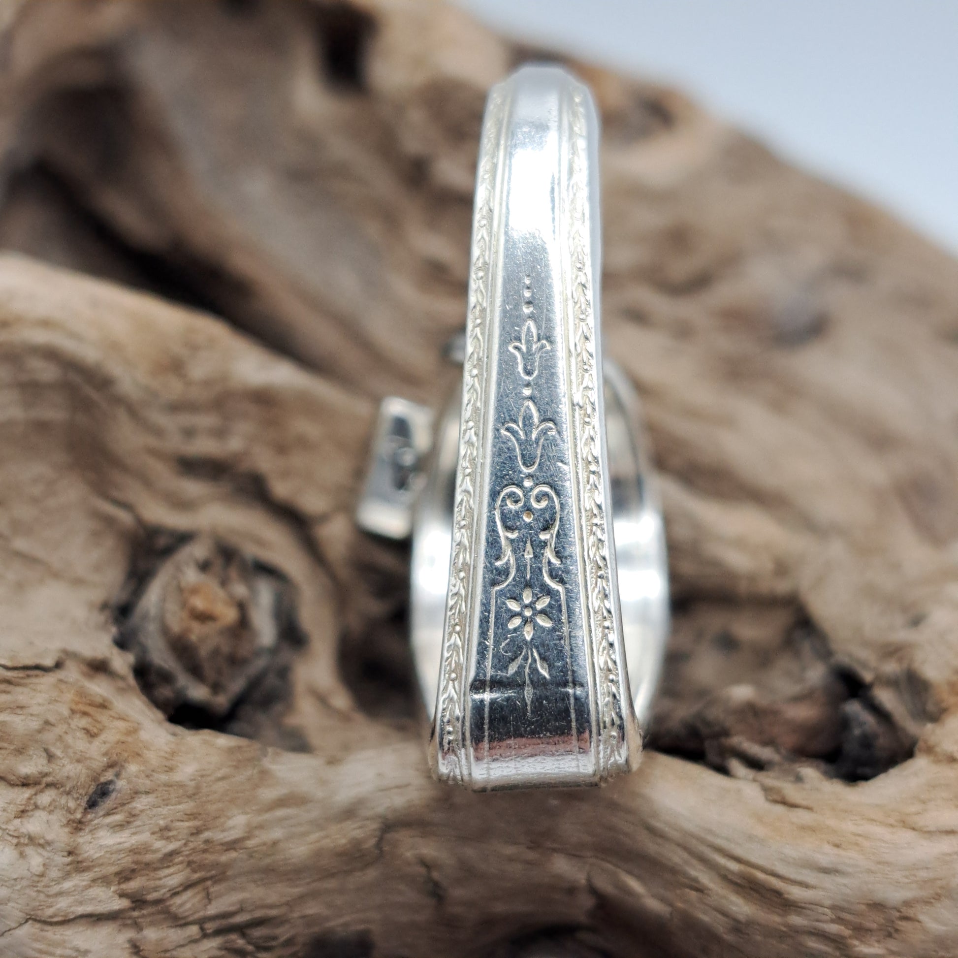 Handmade vintage silverware heart necklace made from various silverplate patterns 