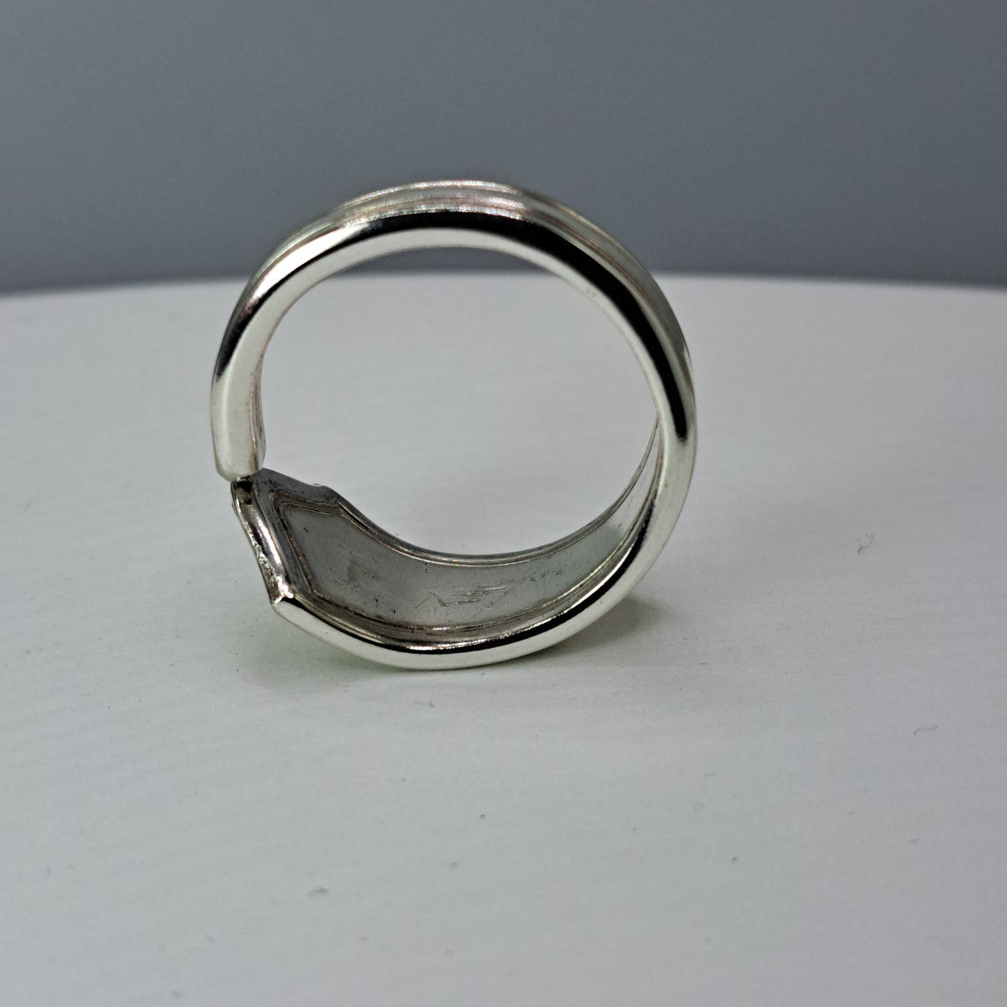 Handmade vintage spoon ring made from an unknown silverplate pattern size 14.25