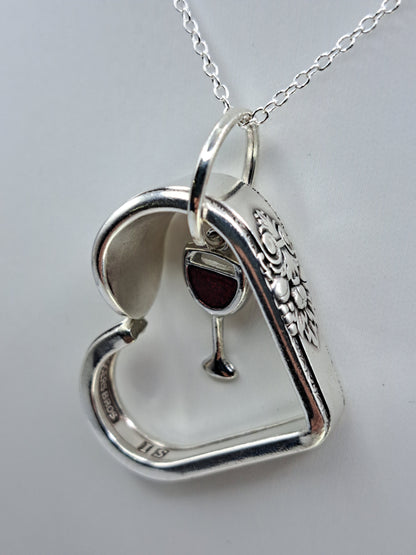Handmade vintage silverware heart necklace made from Adoration 1930 silverplate pattern with red wine glass charm
