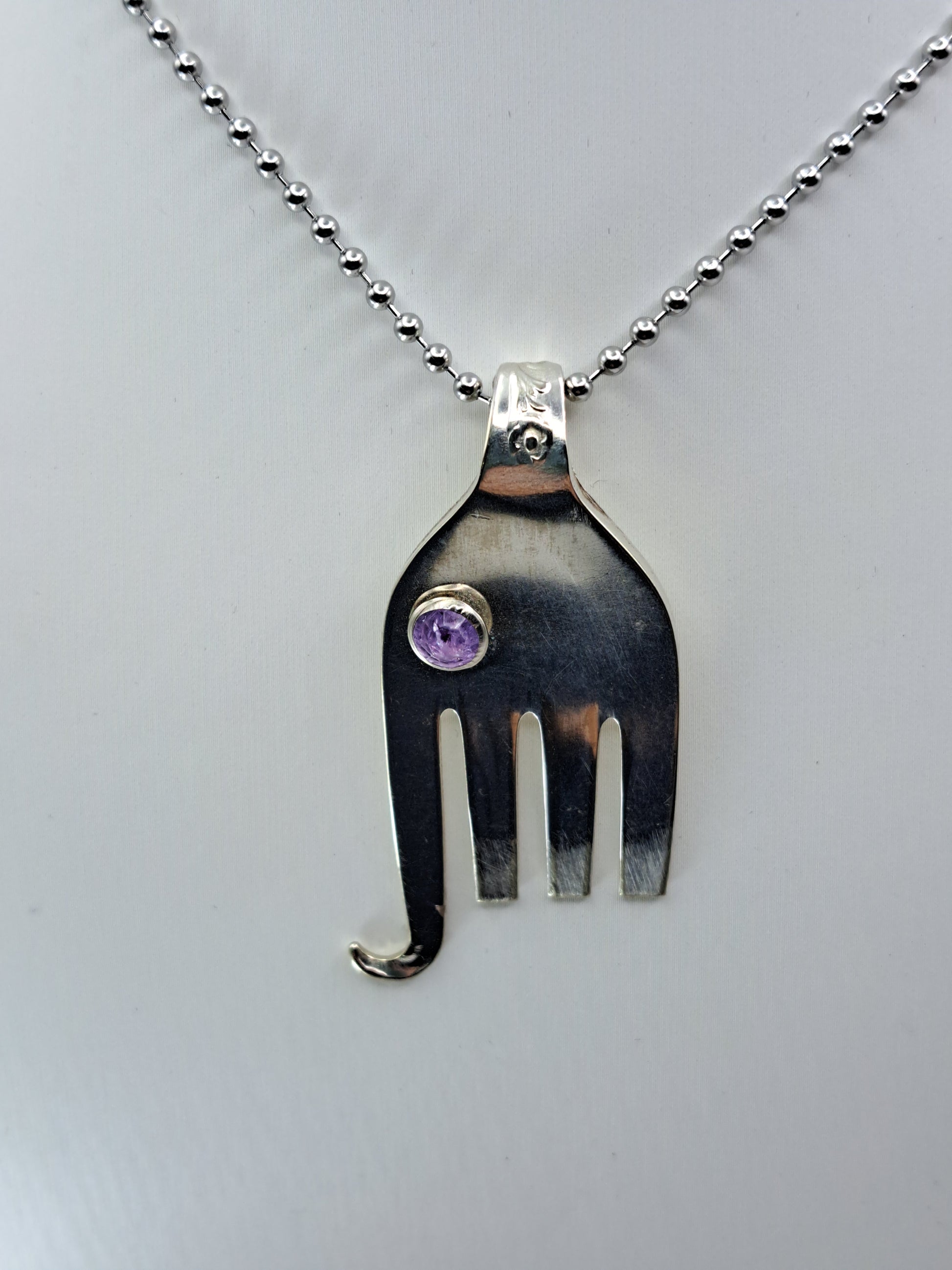 Handmade vintage silverware elephant necklace made a fork end with purple crystal eye