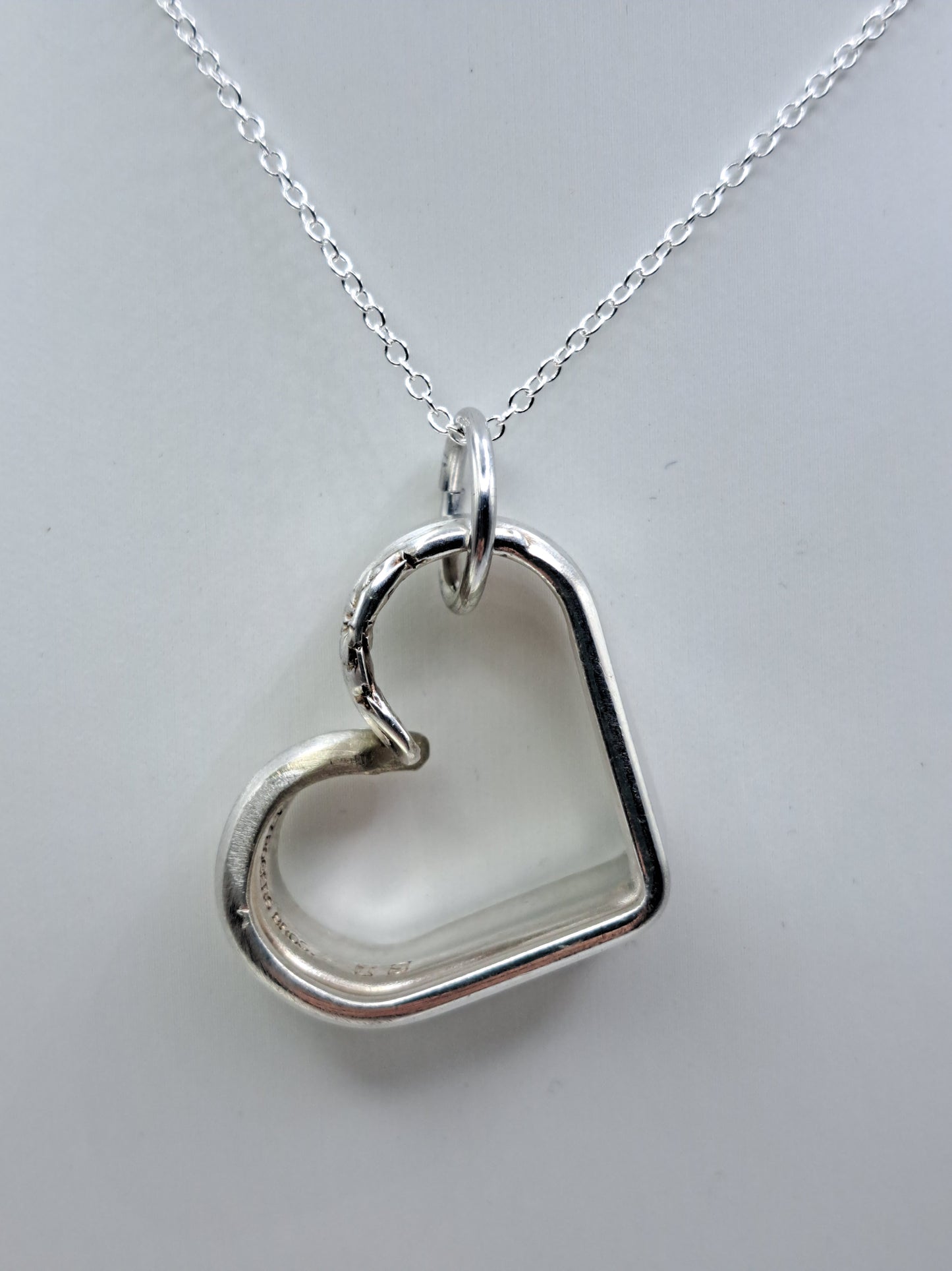 Handmade vintage silverware heart necklace made from Leilani 1961 silverplate pattern