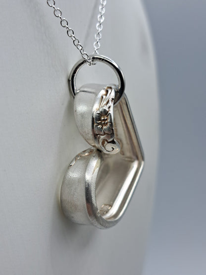 Handmade vintage silverware heart necklace made from Leilani 1961 silverplate pattern