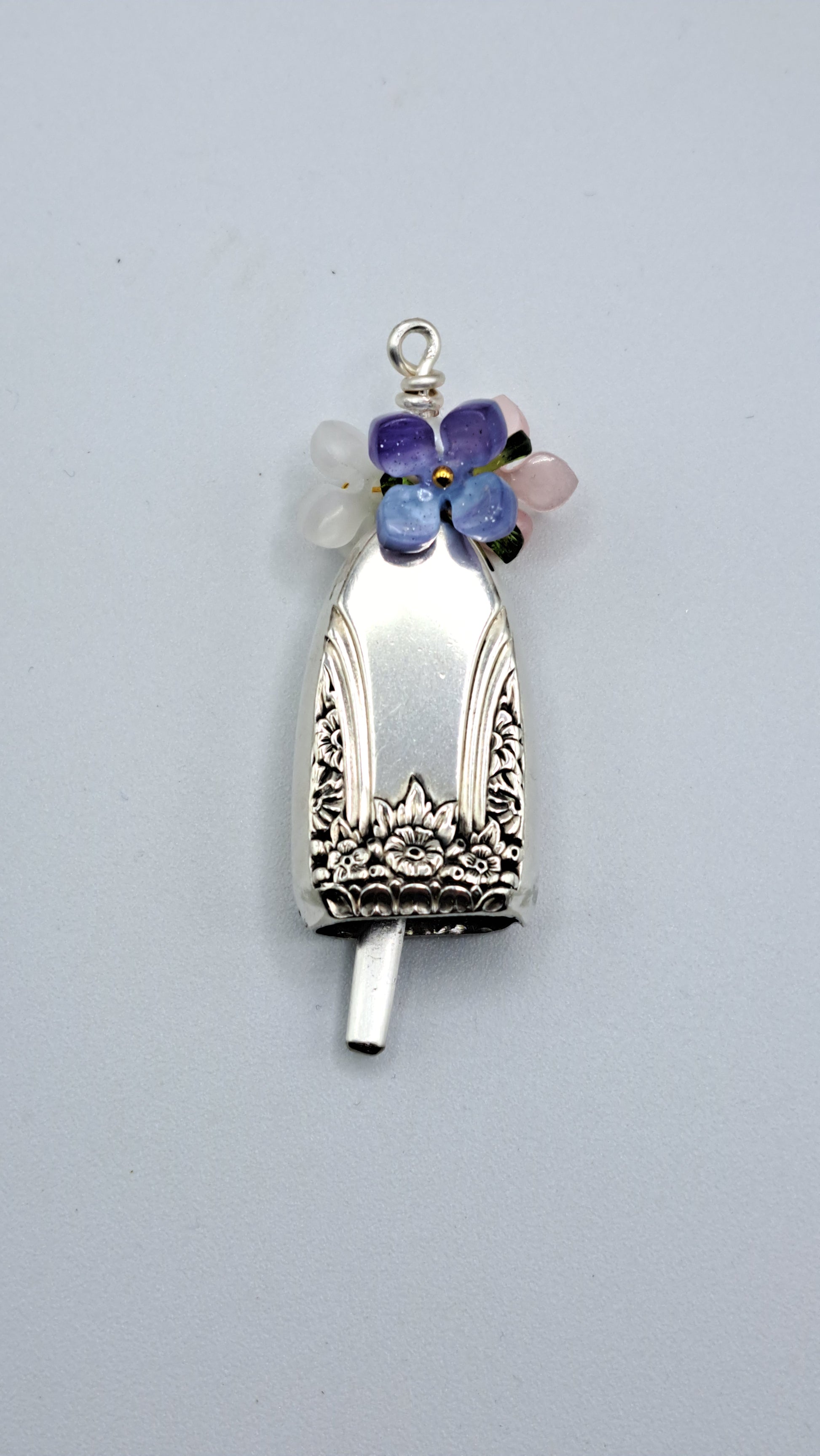 Handmade vintage silverware necklace made from First Love 1937 silverplate shaped like a bell with fork tine ringer