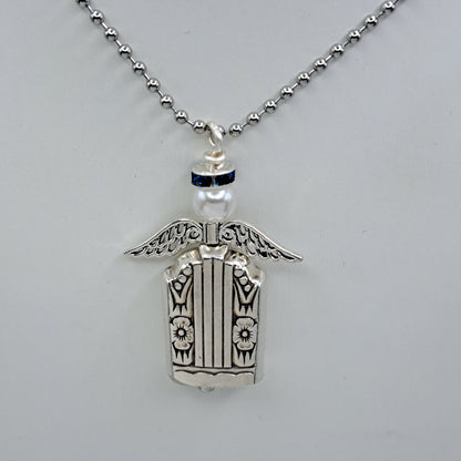 Handmade vintage silverware necklace made from Harmony 1938 silverplate into an angel bell with blue halo 