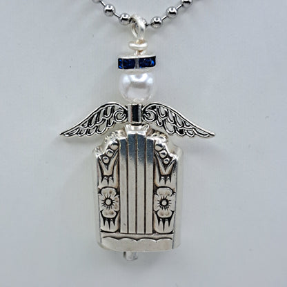 Handmade vintage silverware necklace made from Harmony 1938 silverplate into an angel bell with blue halo 