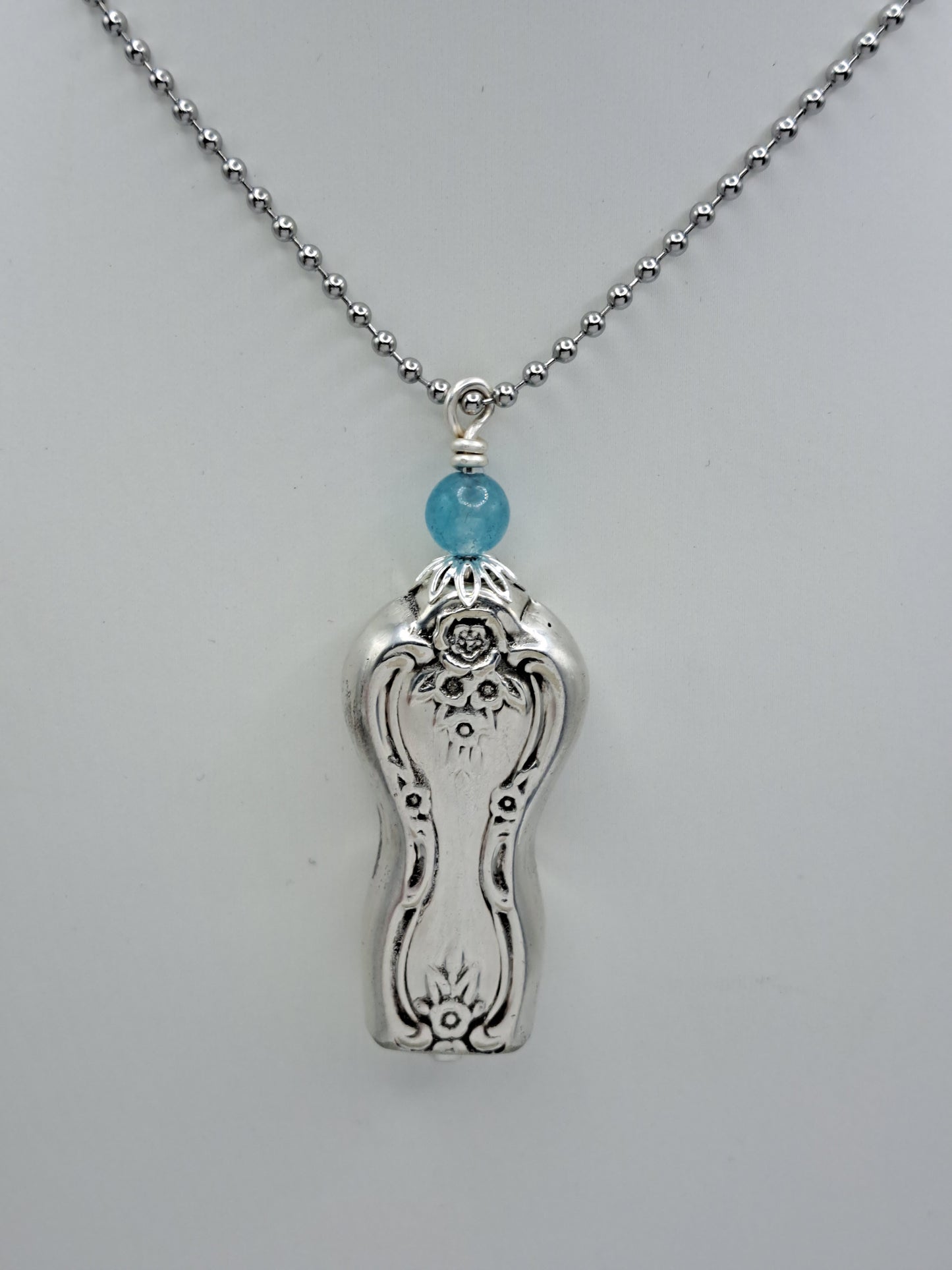 Handmade vintage silverware necklace made from Inspiration-Magnolia 1951 silverplate shaped like a bell with fork tine ringer