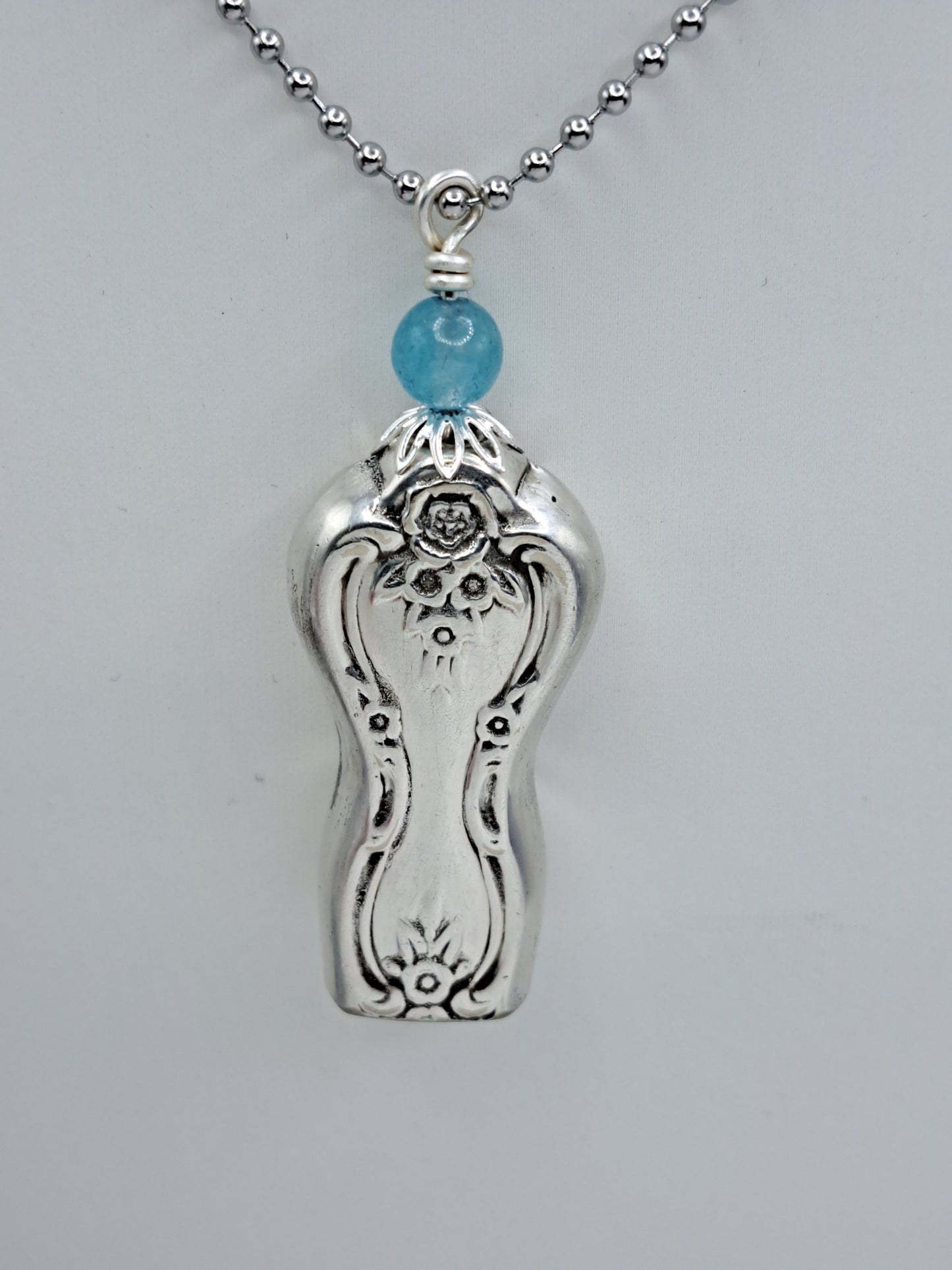 Handmade vintage silverware necklace made from Inspiration-Magnolia 1951 silverplate shaped like a bell with fork tine ringer