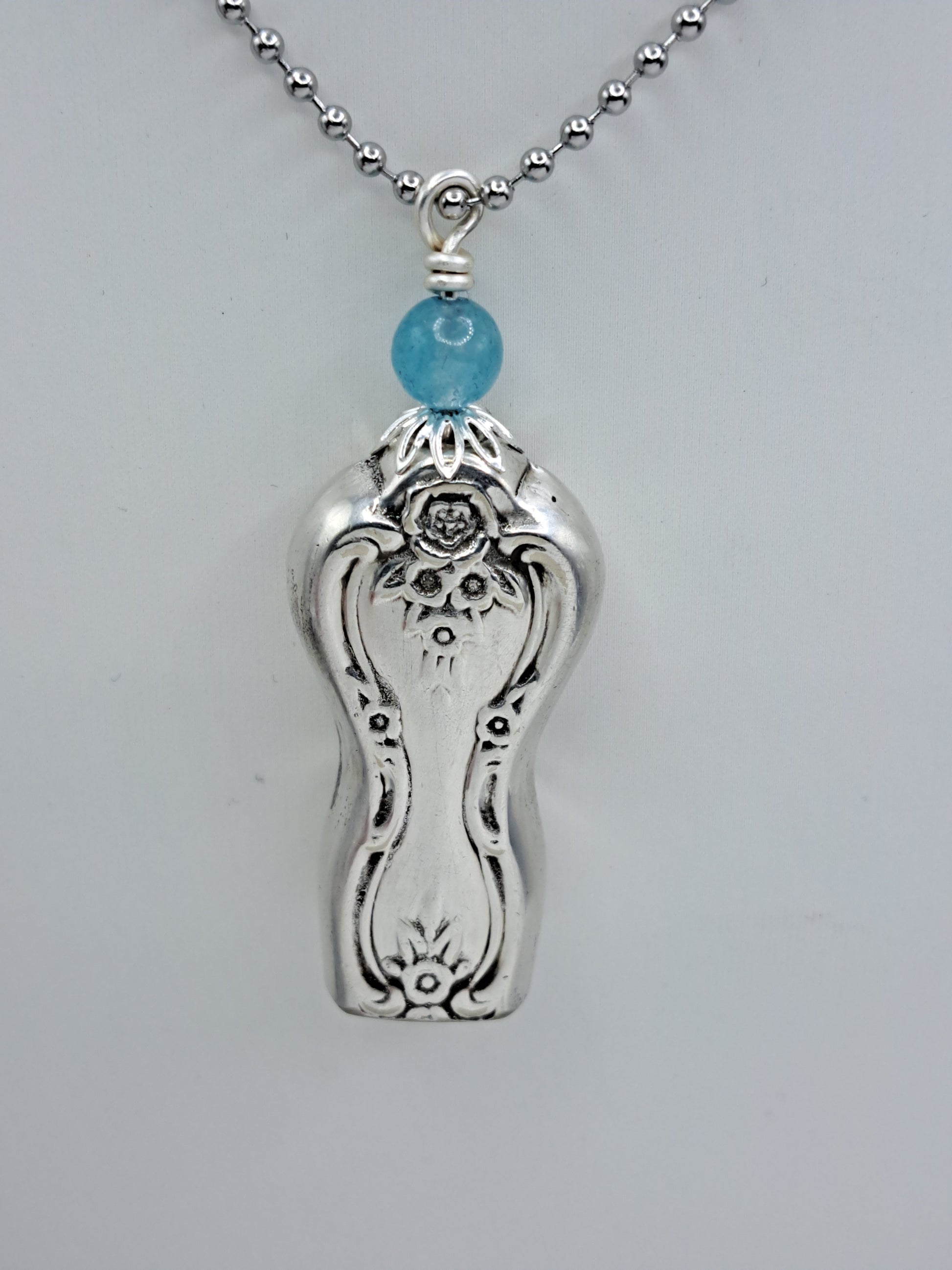 Handmade vintage silverware necklace made from Inspiration-Magnolia 1951 silverplate shaped like a bell with fork tine ringer
