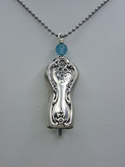 Handmade vintage silverware necklace made from Inspiration-Magnolia 1951 silverplate shaped like a bell with fork tine ringer