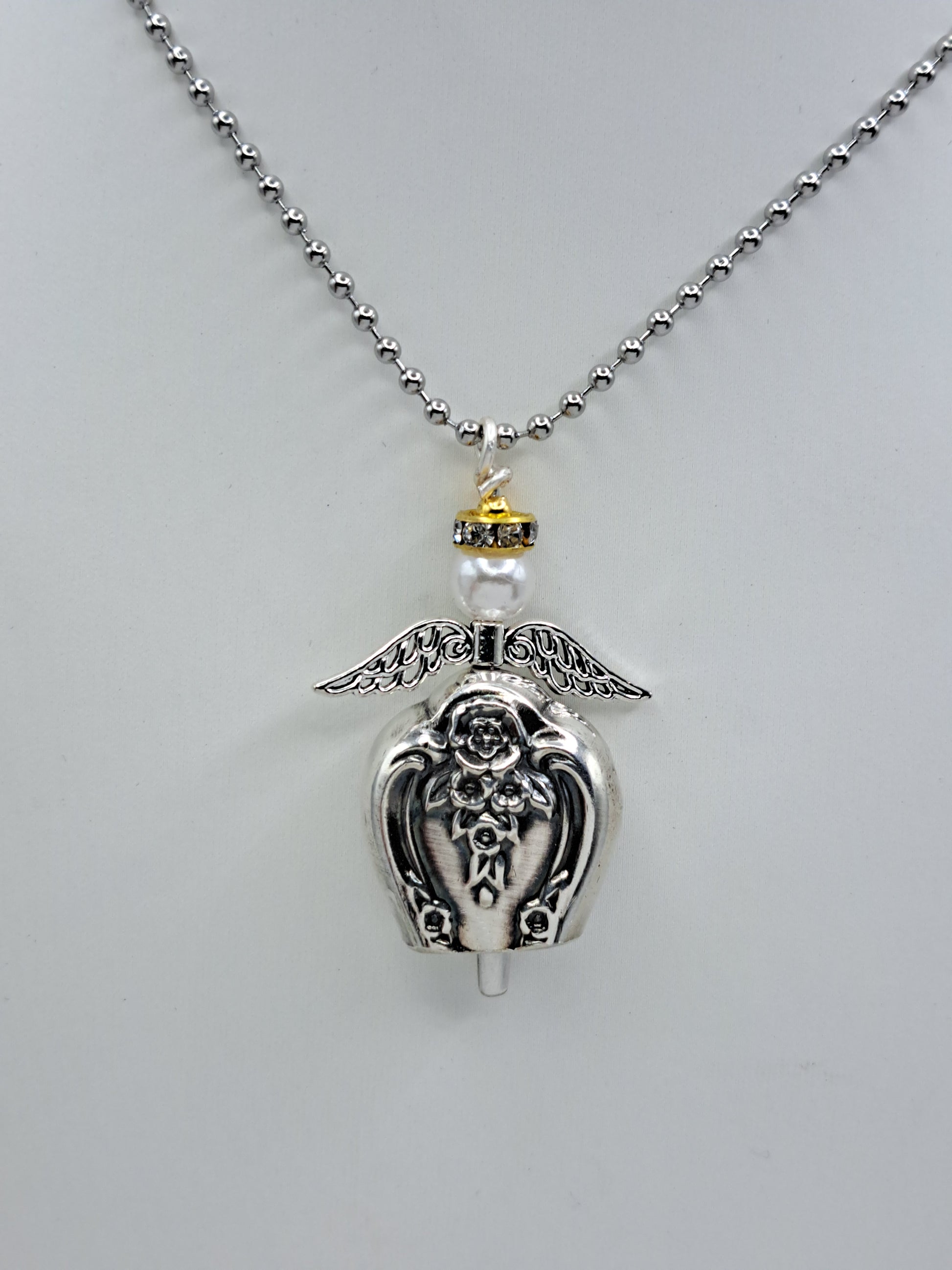 Handmade vintage silverware necklace made from Inspiration-Magnolia 1951 silverplate into an angel bell with yellow halo