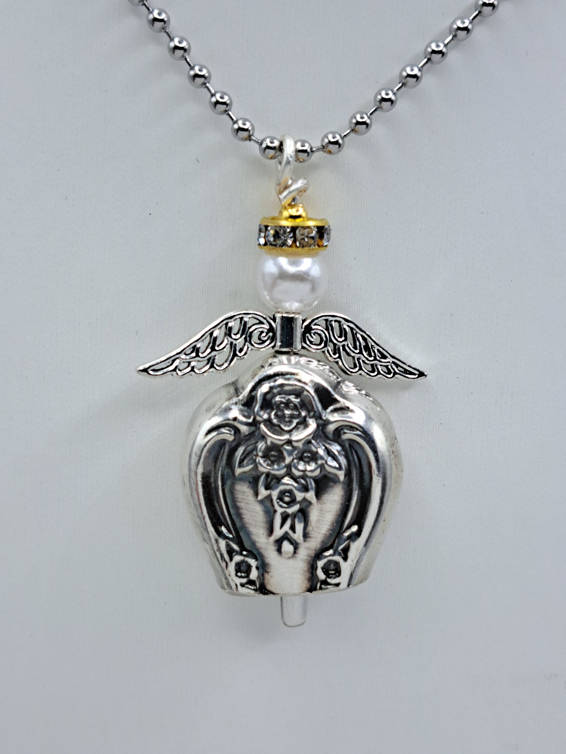 Handmade vintage silverware necklace made from Inspiration-Magnolia 1951 silverplate into an angel bell with yellow halo