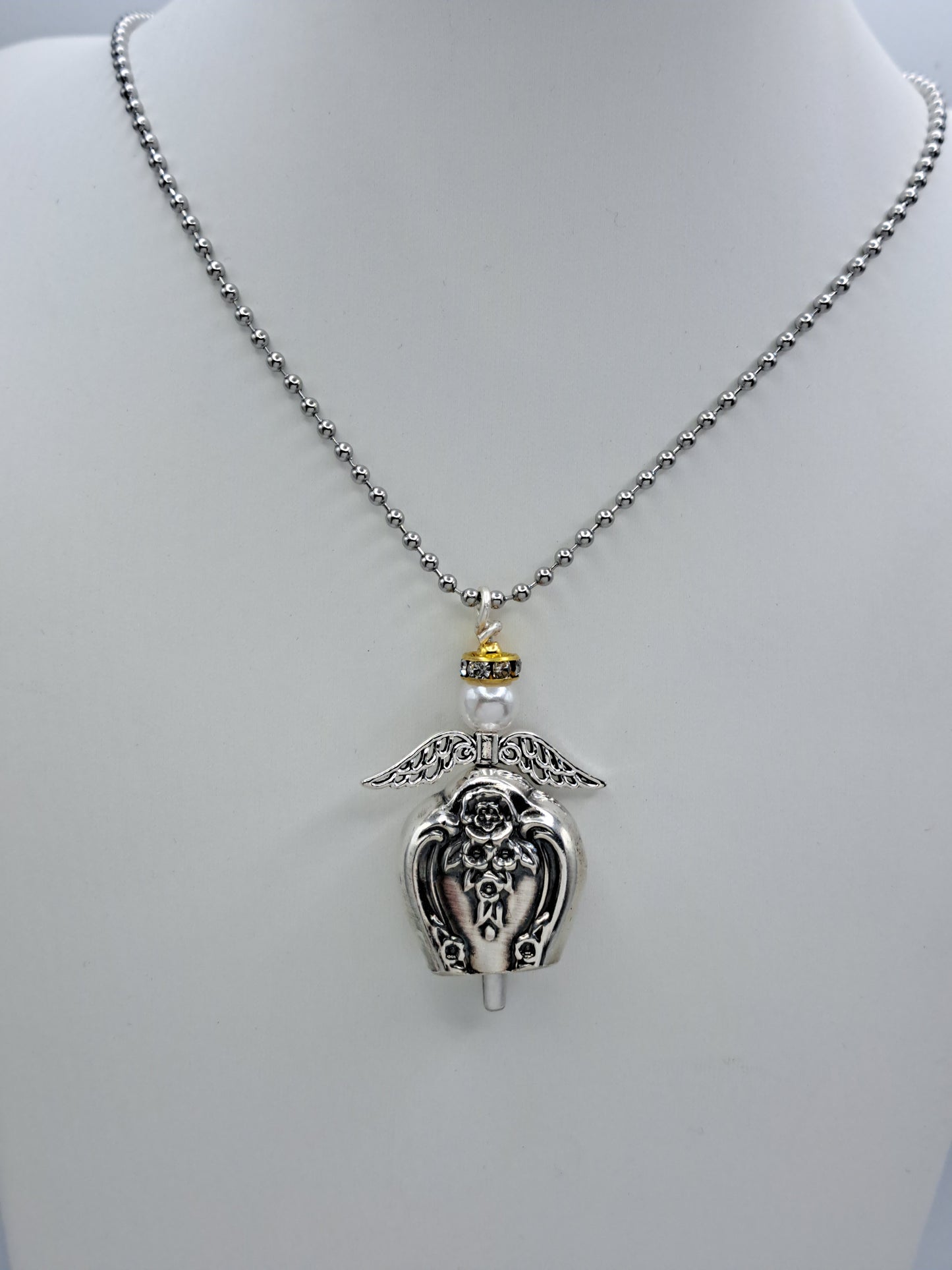 Handmade vintage silverware necklace made from Inspiration-Magnolia 1951 silverplate into an angel bell with yellow halo