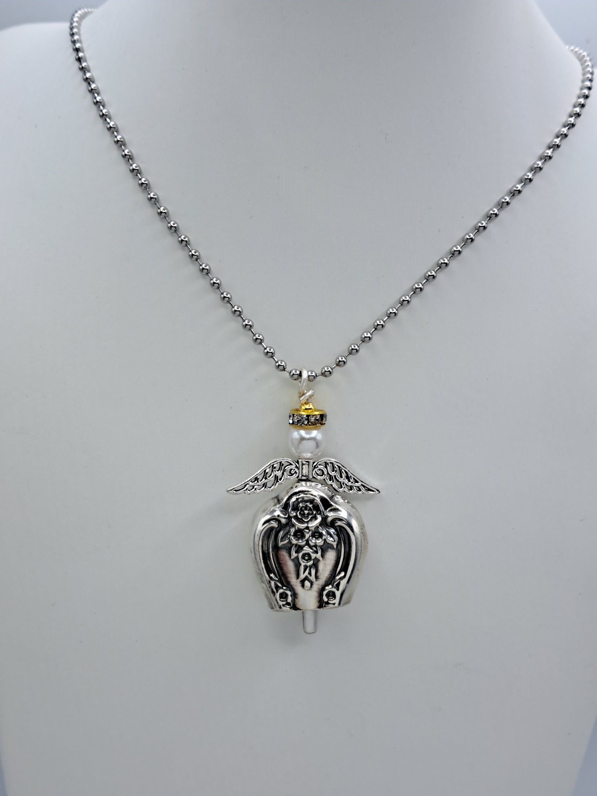 Handmade vintage silverware necklace made from Inspiration-Magnolia 1951 silverplate into an angel bell with yellow halo