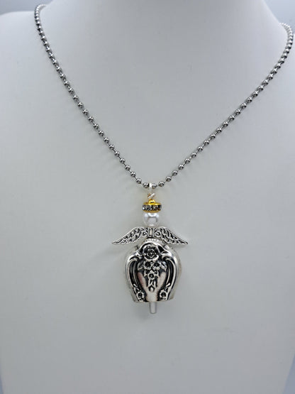 Handmade vintage silverware necklace made from Inspiration-Magnolia 1951 silverplate into an angel bell with yellow halo