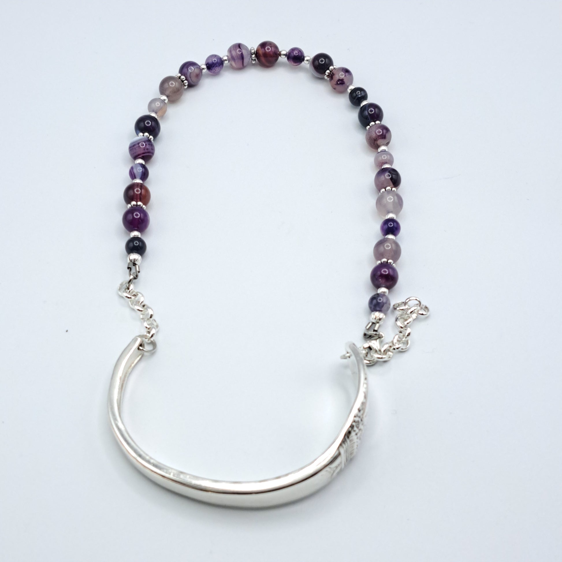 Handmade vintage silverware bracelet made from First Love 1937 silverplated handles with purple marble agate gemstone beads