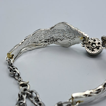 Handmade vintage silverware bracelet made from Silver Renaissance 1971 pattern silverplated handles with center snap charm