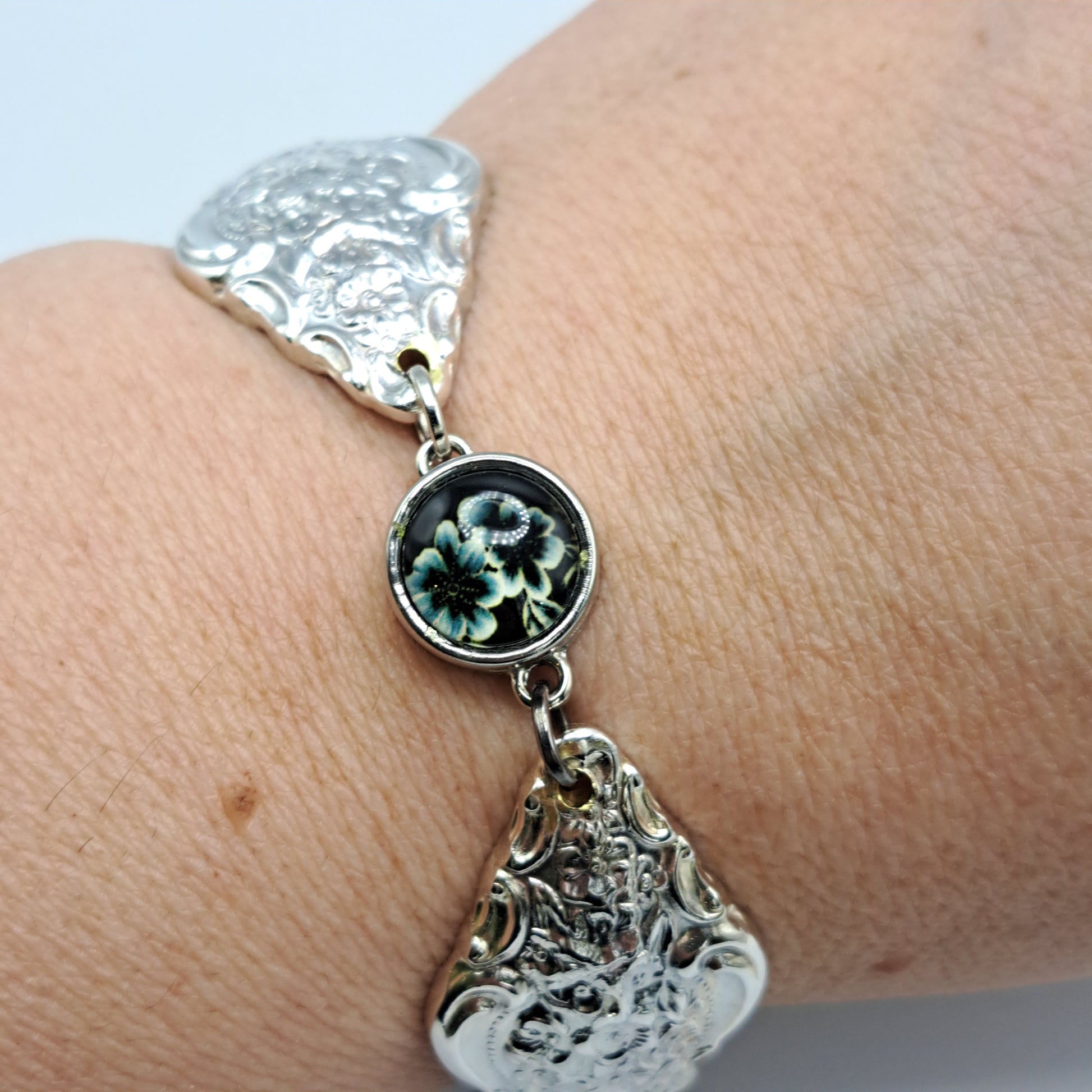 Handmade vintage silverware bracelet made from Silver Renaissance 1971 pattern silverplated handles with center snap charm
