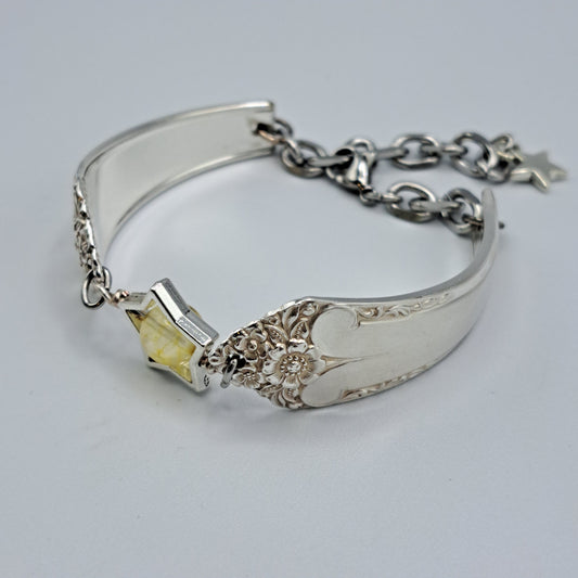 Handmade vintage silverware bracelet made from Starlight 1950 pattern silverplated handles with citrine gemstone center