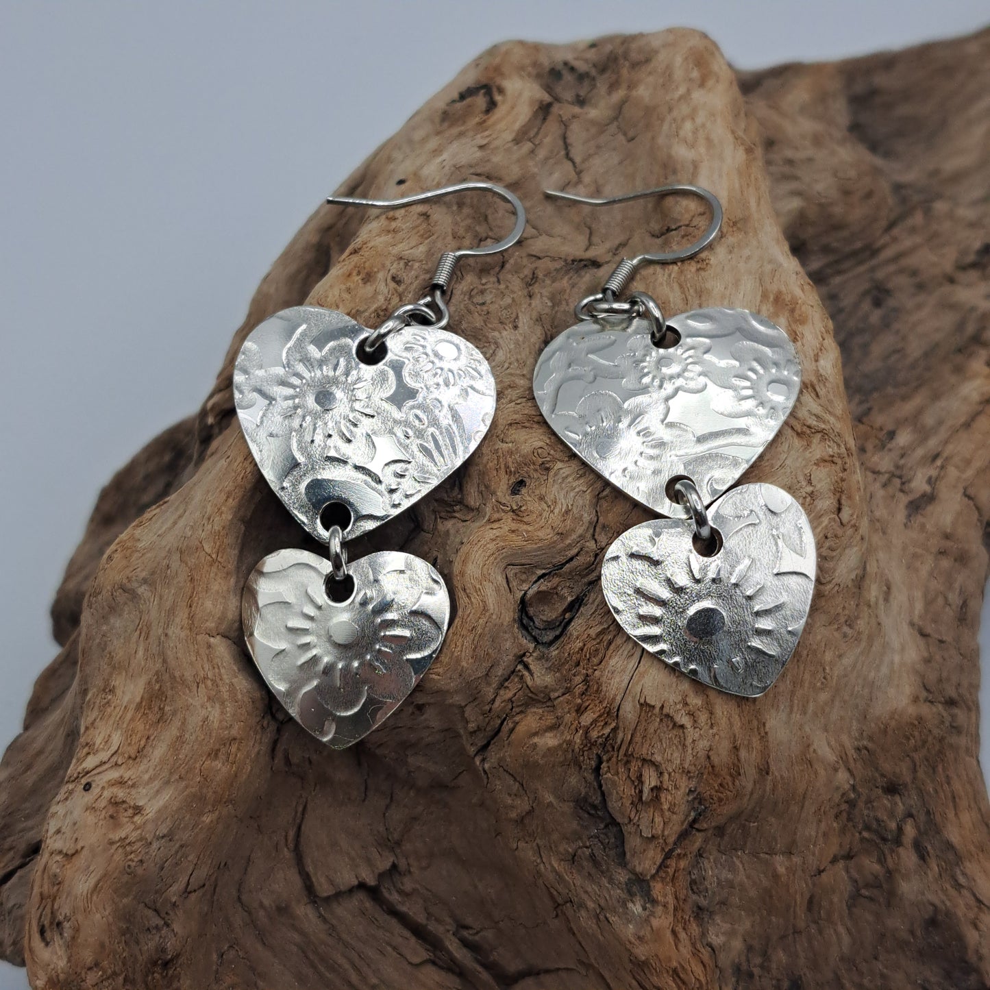 Handmade vintage silverware earrings made from silver-plated flattened spoon bowls