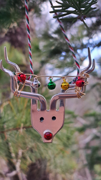 Handmade vintage silverware Christmas Ornament made from a fork shaped as a reindeer with christmas bells in antlers