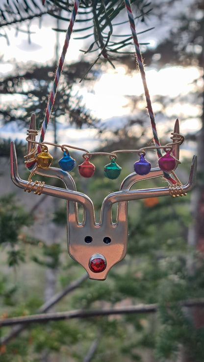 Handmade vintage silverware Christmas Ornament made from a fork shaped as a reindeer with christmas bells in antlers