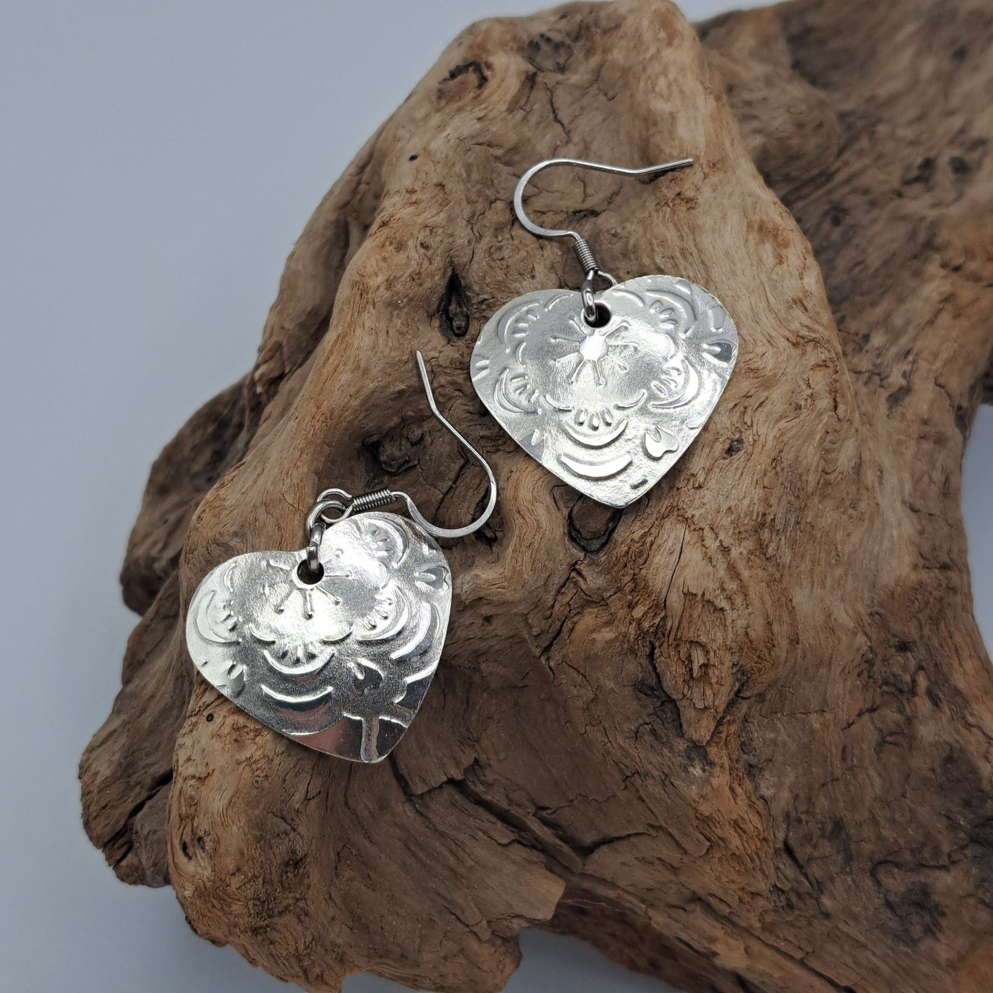 Handmade vintage silverware earrings made from silver-plated flattened spoon bowls