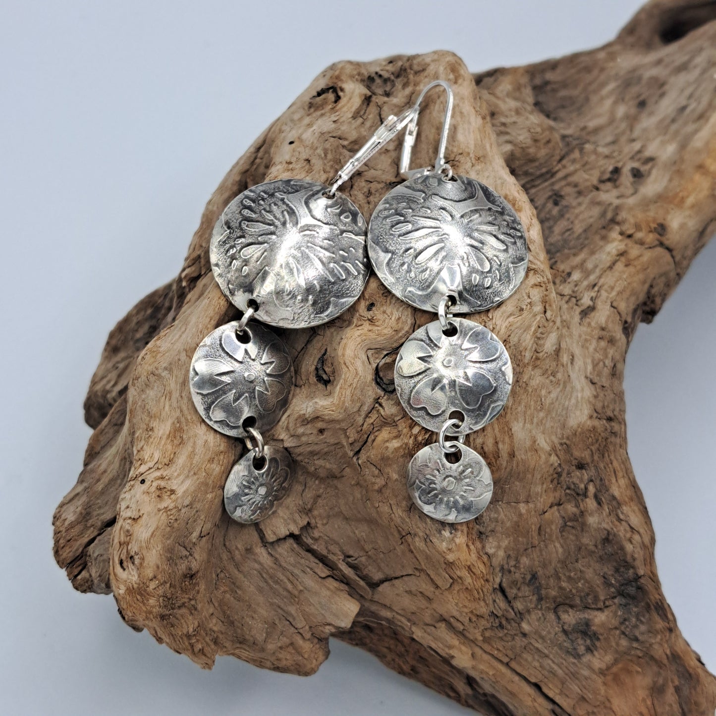 Handmade vintage silverware earrings made from silver-plated flattened spoon bowls