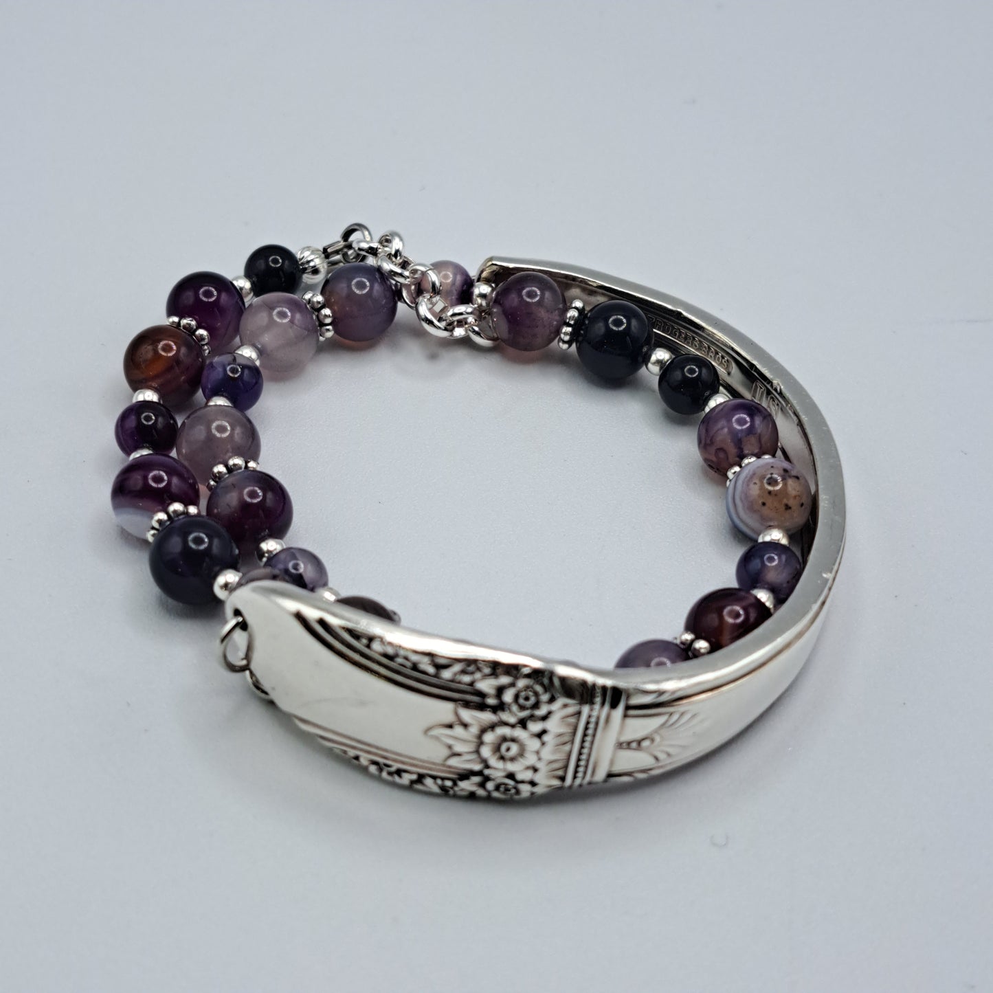 Handmade vintage silverware bracelet made from First Love 1937 silverplated handles with purple marble agate gemstone beads
