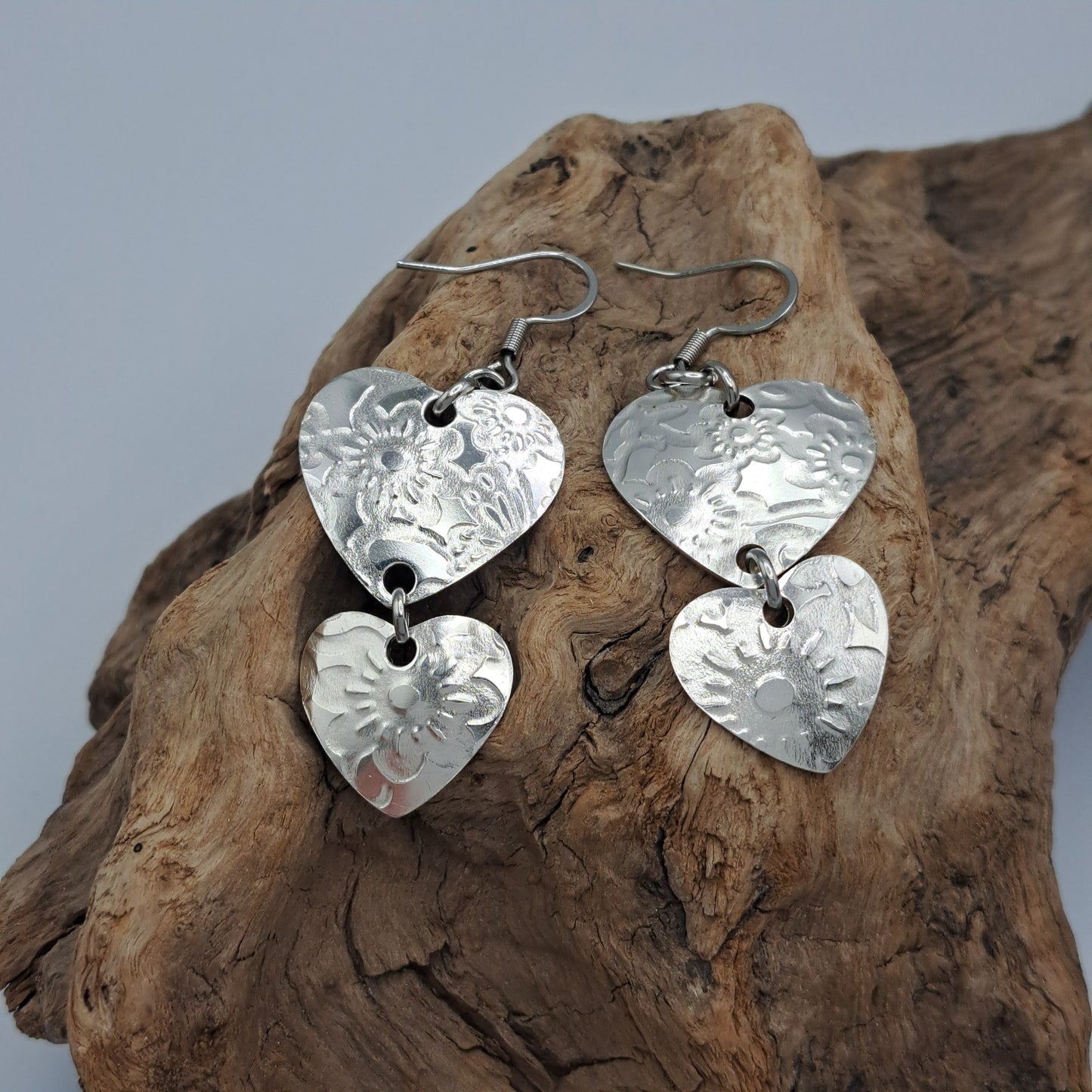 Handmade vintage silverware earrings made from silver-plated flattened spoon bowls