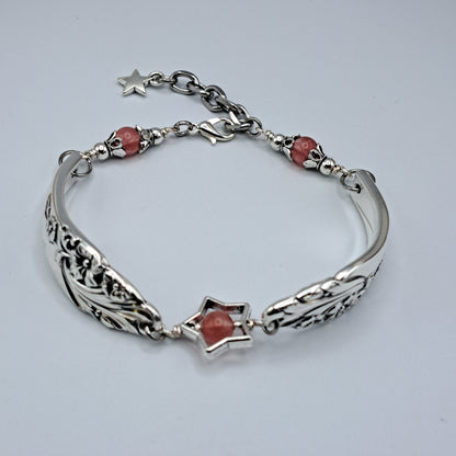 Handmade vintage silverware bracelet made from Evening Star 1950 silverplated handles with center cherry quartz and side beads