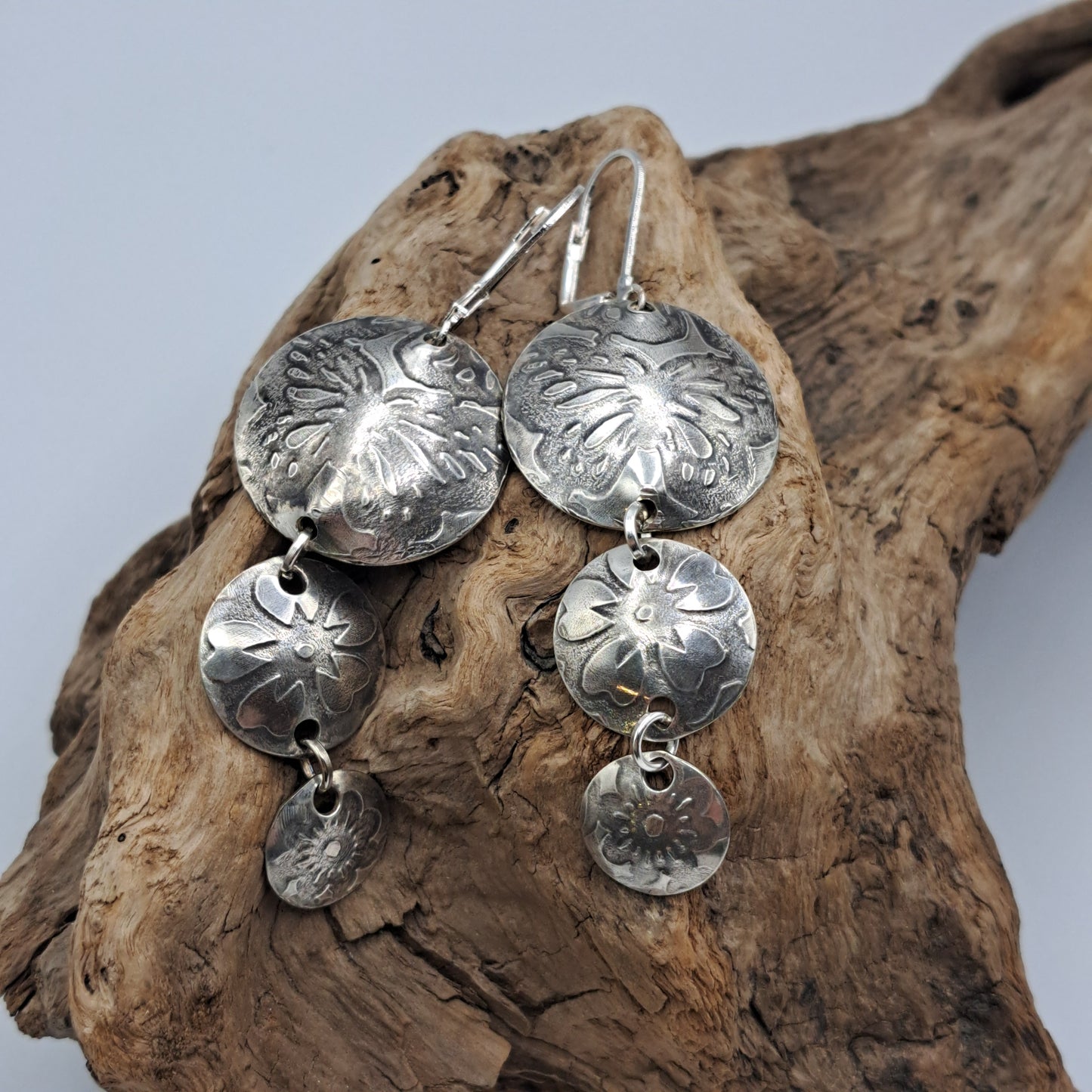 Handmade vintage silverware earrings made from silver-plated flattened spoon bowls