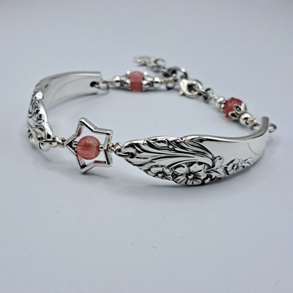 Handmade vintage silverware bracelet made from Evening Star 1950 silverplated handles with center cherry quartz and side beads