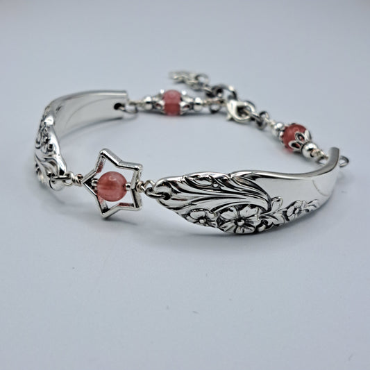 Handmade vintage silverware bracelet made from Evening Star 1950 silverplated handles with center cherry quartz and side beads