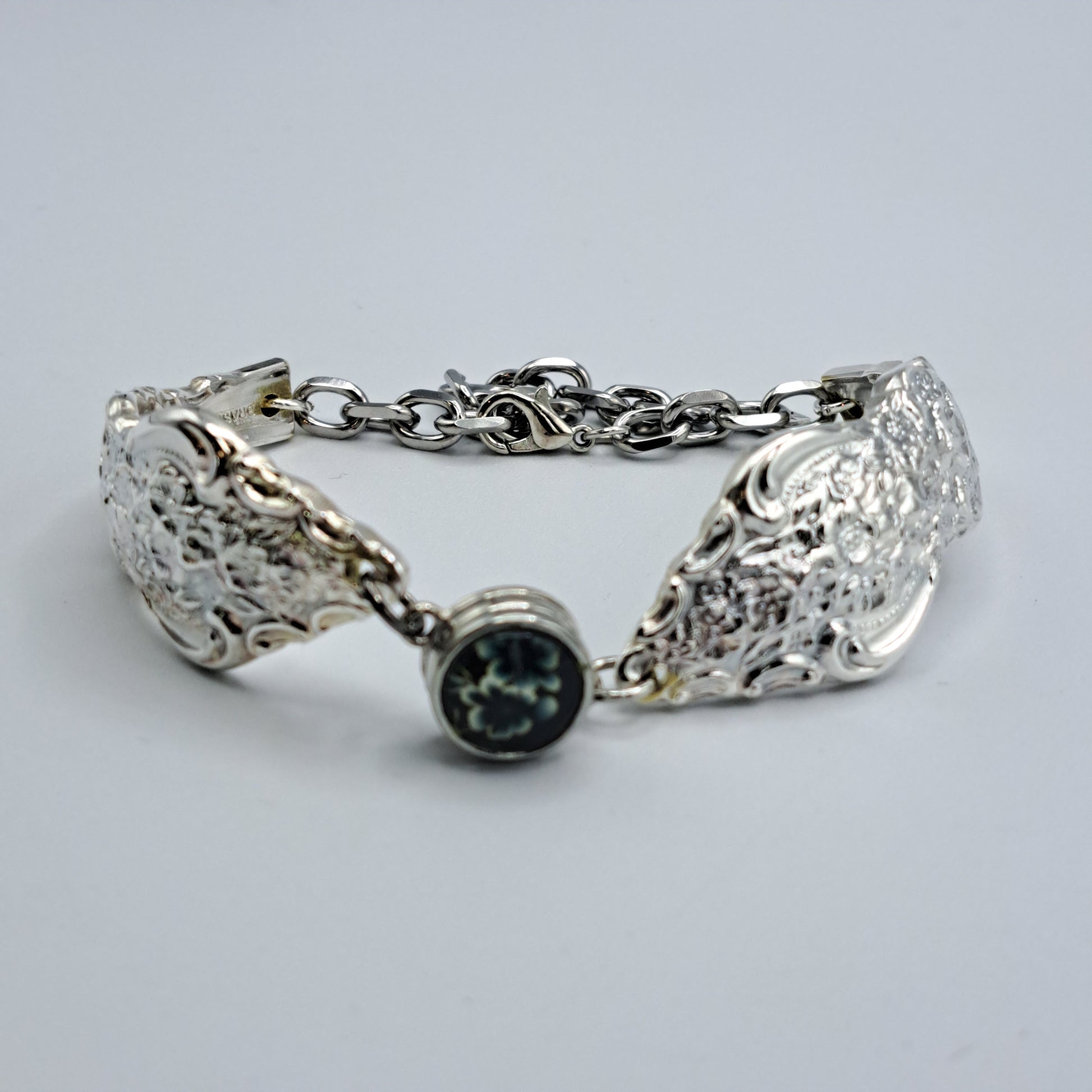 Handmade vintage silverware bracelet made from Silver Renaissance 1971 pattern silverplated handles with center snap charm