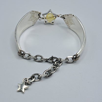 Handmade vintage silverware bracelet made from Starlight 1950 pattern silverplated handles with citrine gemstone center