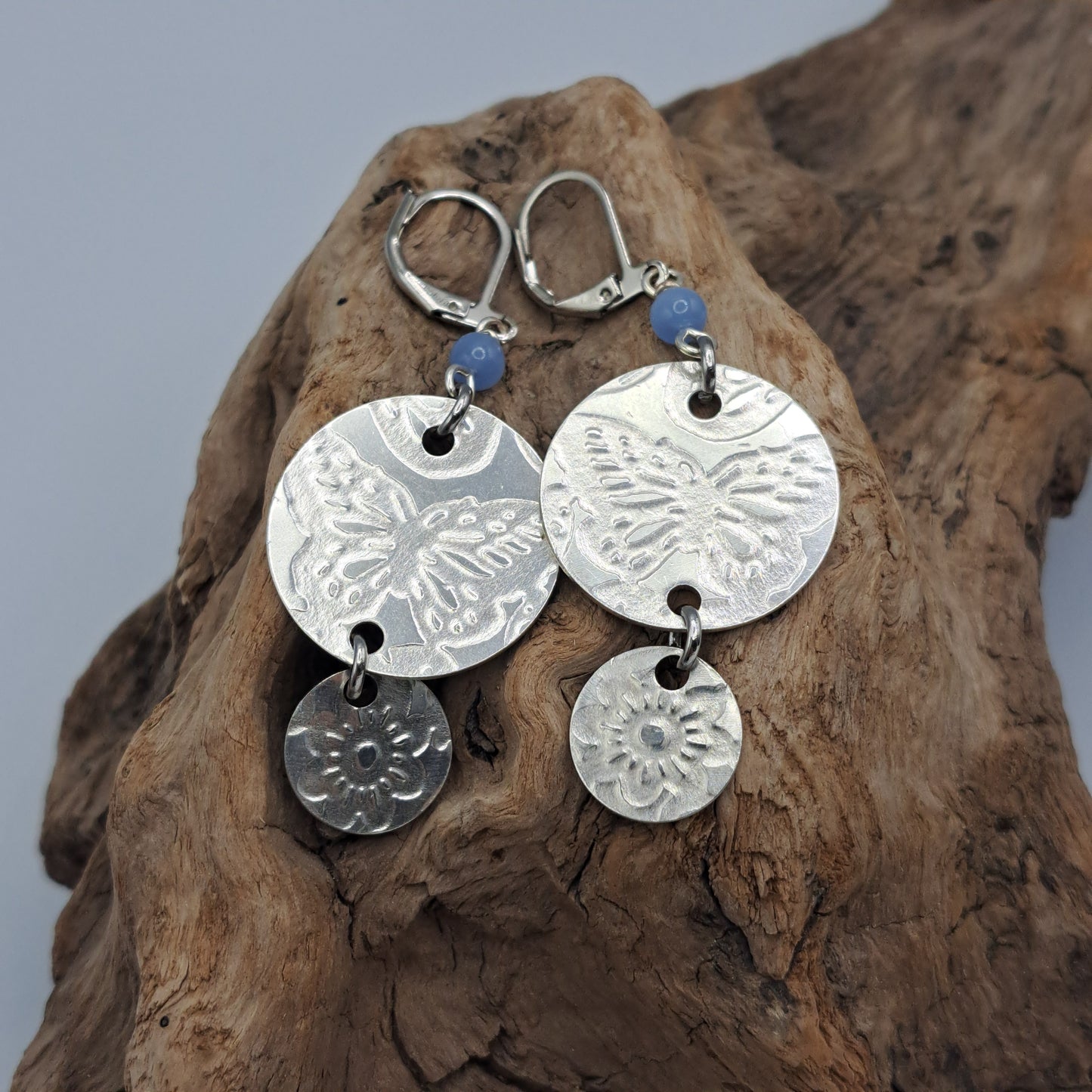 Handmade vintage silverware earrings made from silver-plated flattened spoon bowls