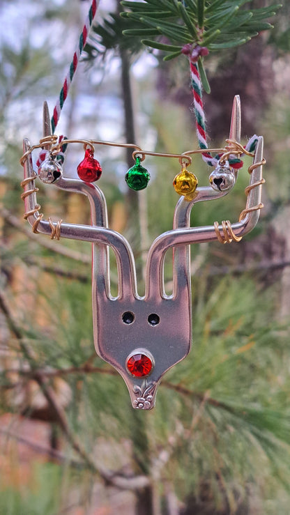 Handmade vintage silverware Christmas Ornament made from a fork shaped as a reindeer with christmas bells in antlers