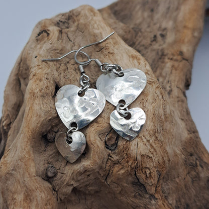 Handmade vintage silverware earrings made from silver-plated flattened spoon bowls