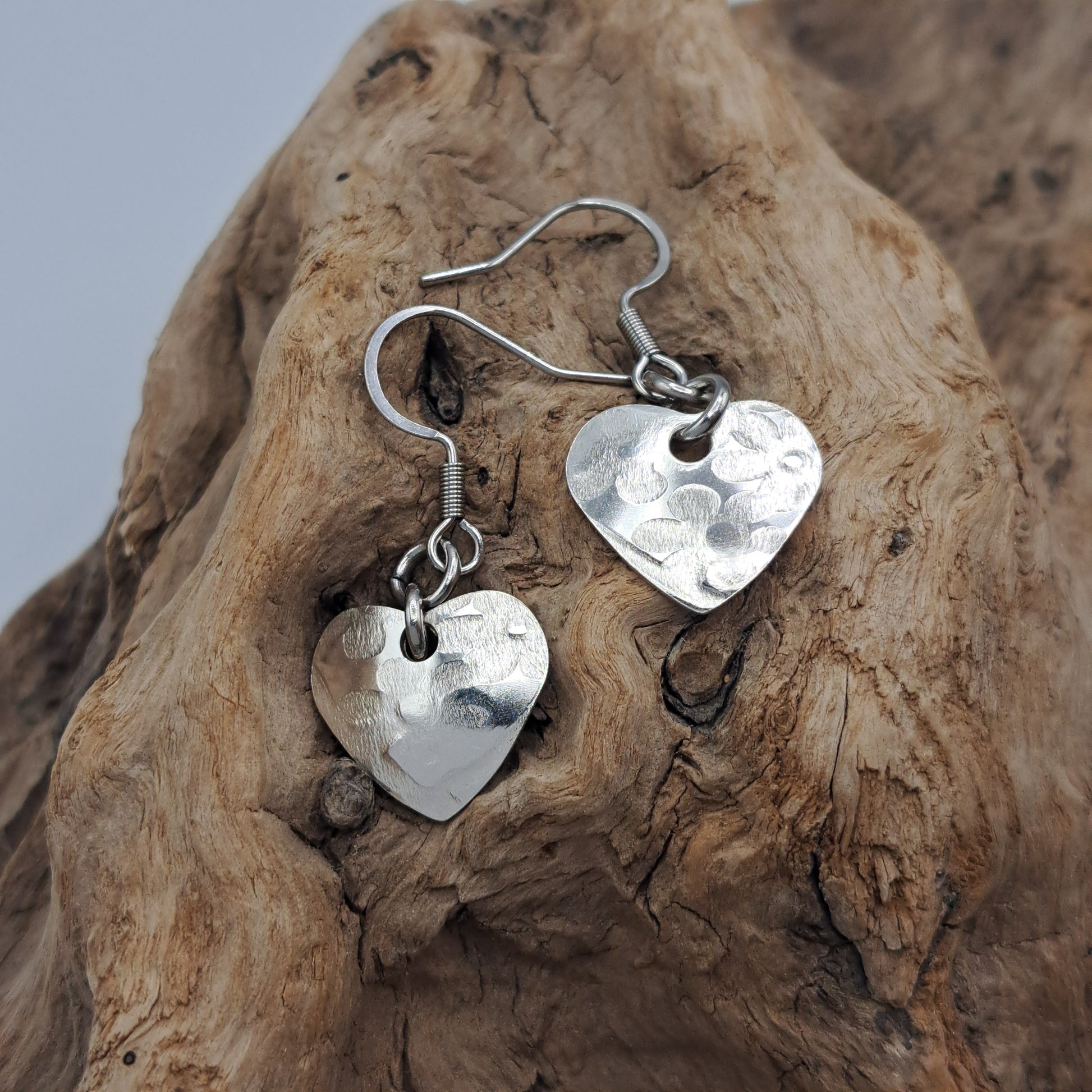 Handmade vintage silverware earrings made from silver-plated flattened spoon bowls