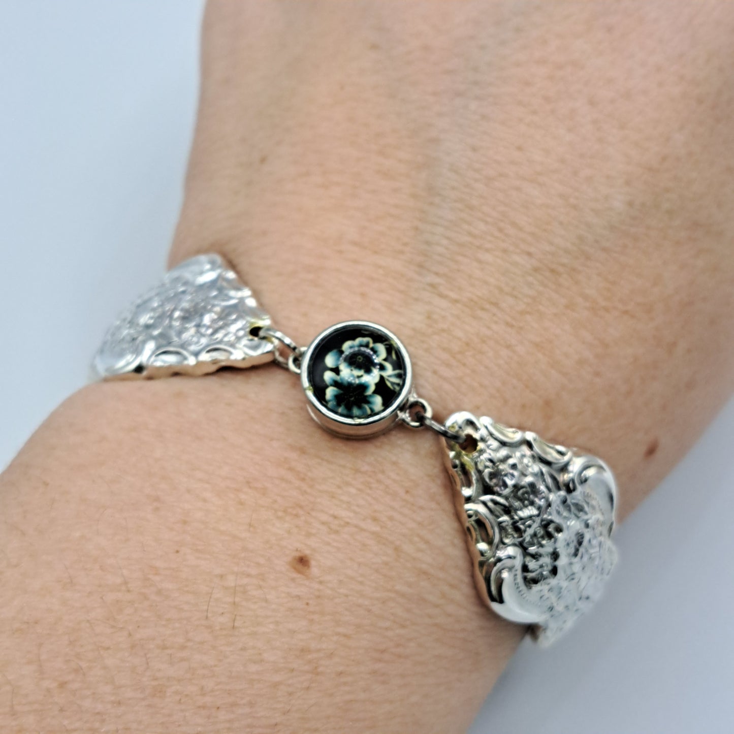 Handmade vintage silverware bracelet made from Silver Renaissance 1971 pattern silverplated handles with center snap charm