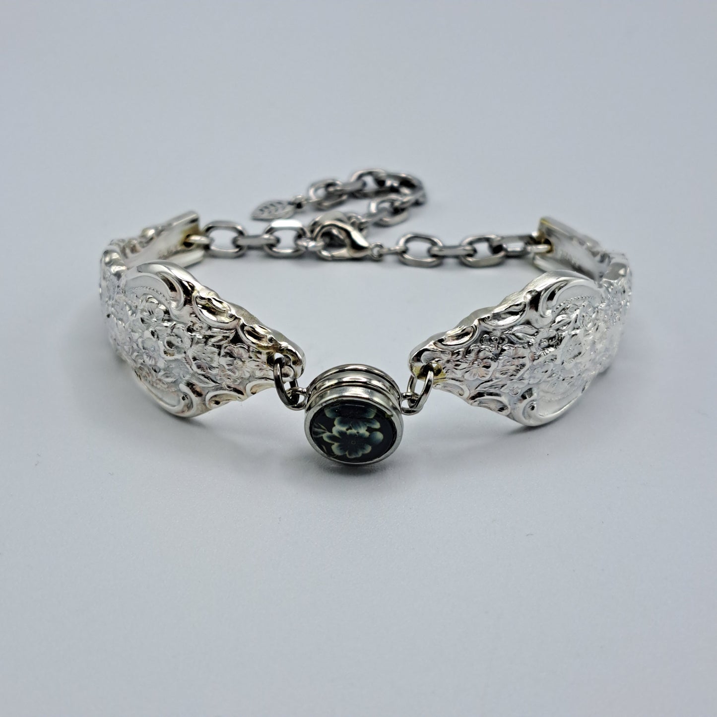 Handmade vintage silverware bracelet made from Silver Renaissance 1971 pattern silverplated handles with center snap charm