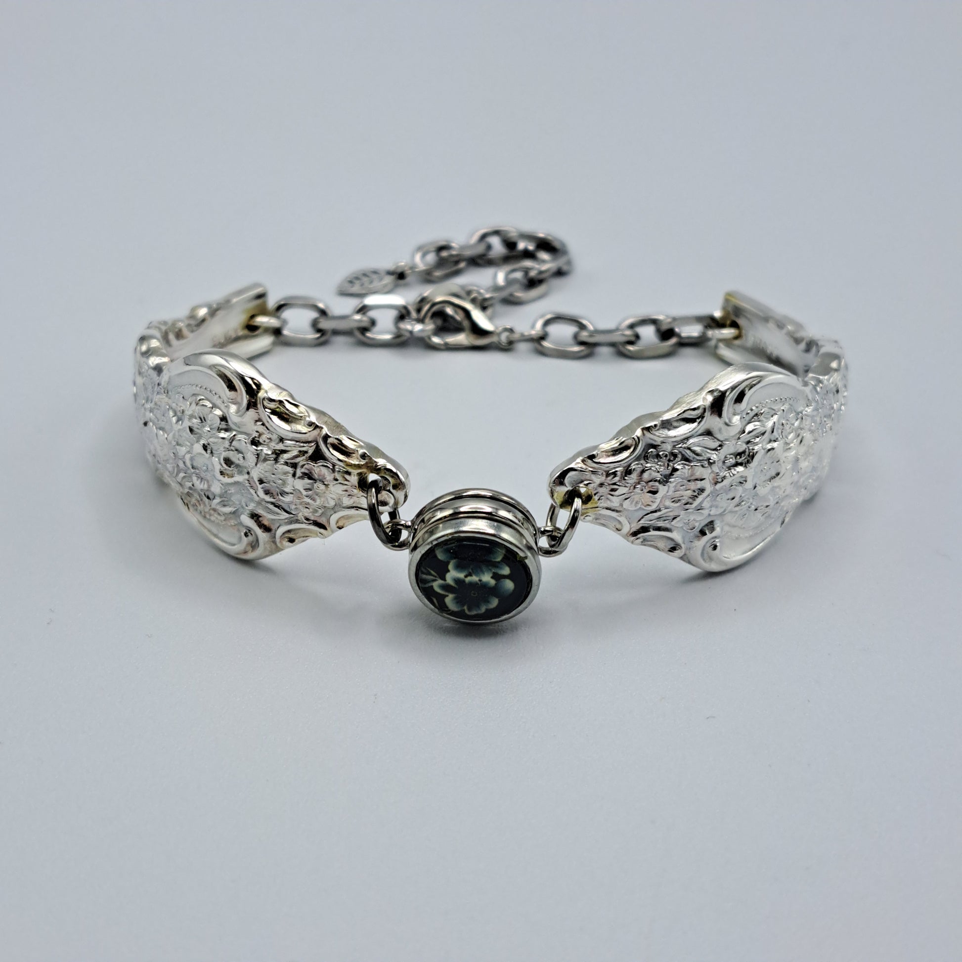 Handmade vintage silverware bracelet made from Silver Renaissance 1971 pattern silverplated handles with center snap charm