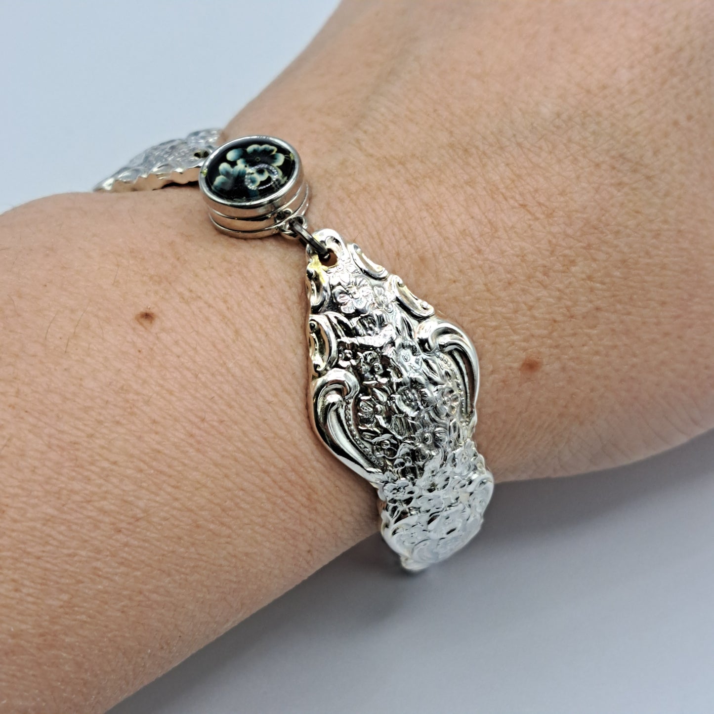 Handmade vintage silverware bracelet made from Silver Renaissance 1971 pattern silverplated handles with center snap charm