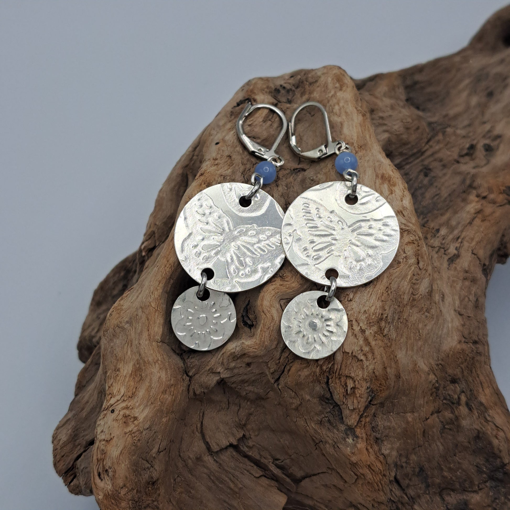 Handmade vintage silverware earrings made from silver-plated flattened spoon bowls