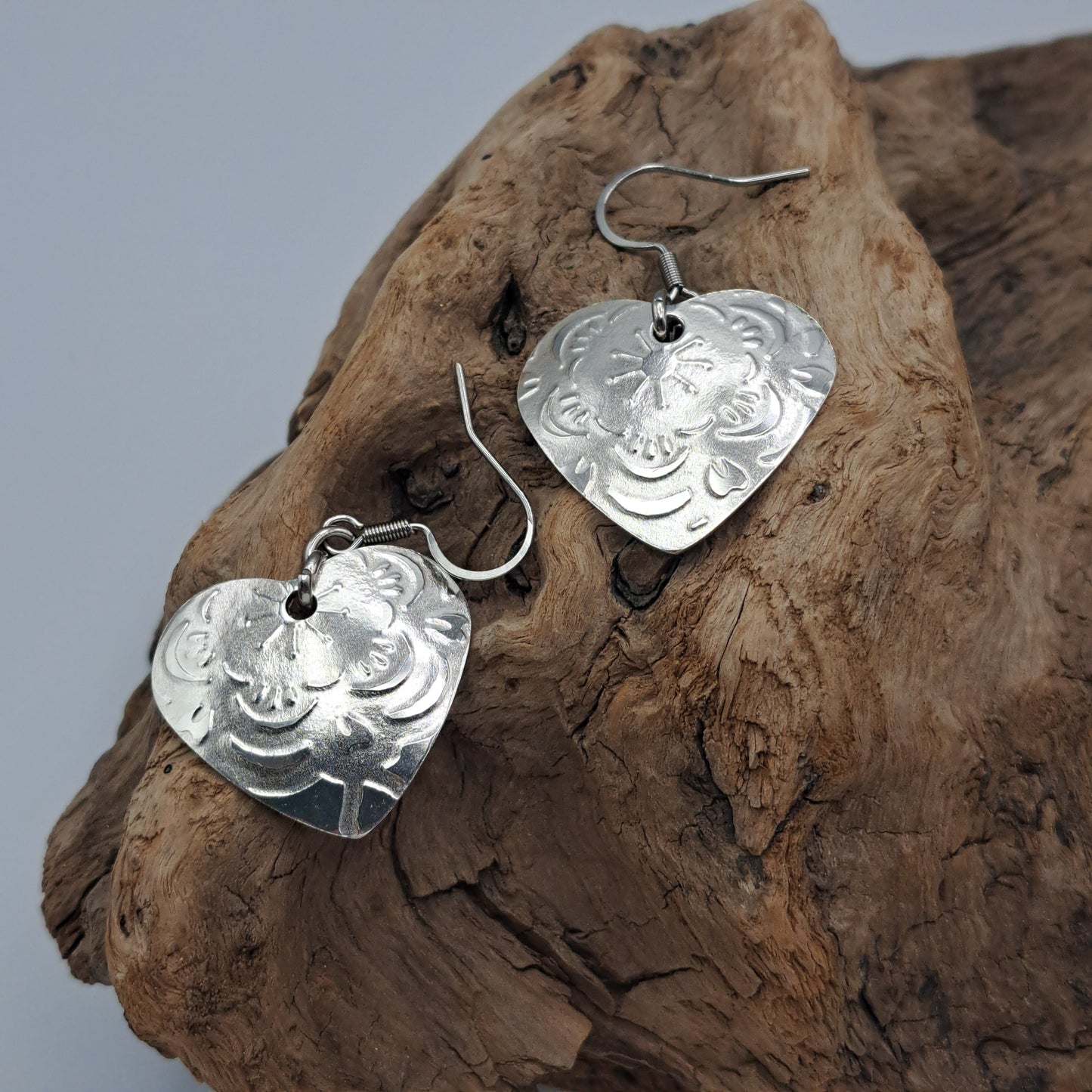 Handmade vintage silverware earrings made from silver-plated flattened spoon bowls
