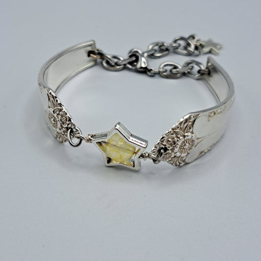 Handmade vintage silverware bracelet made from Starlight 1950 pattern silverplated handles with citrine gemstone center